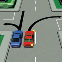Picture of a car passing at an intersection
